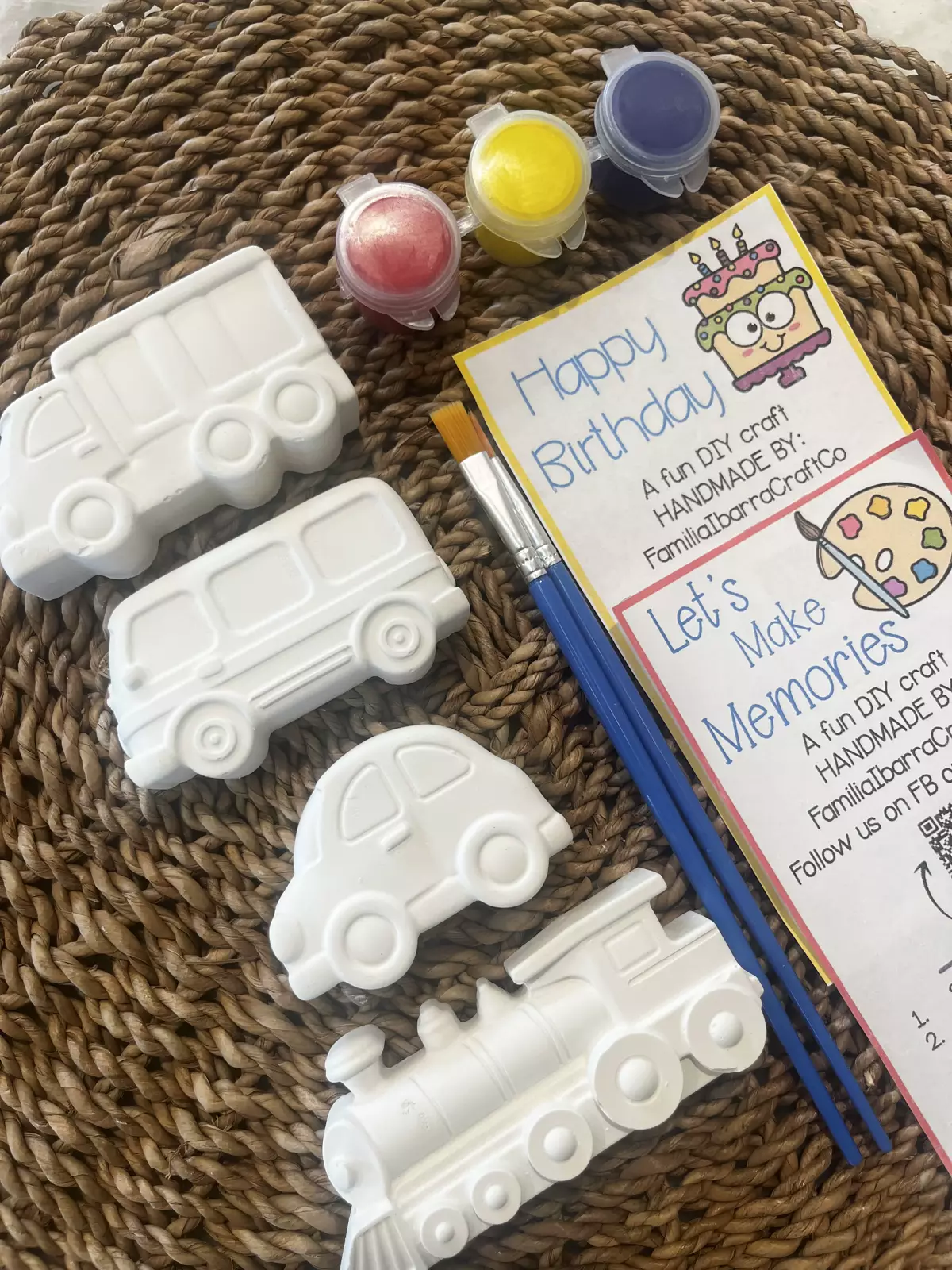Plaster truck, van, car, and train with paint pots and brushes